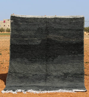 How to Clean a Moroccan Wool Rug Without Shrinking It