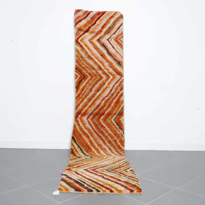 Vintage Boujaad Rug 11.1×2.5 ft – Handmade Moroccan Wool Runner with Warm Zigzag Pattern
