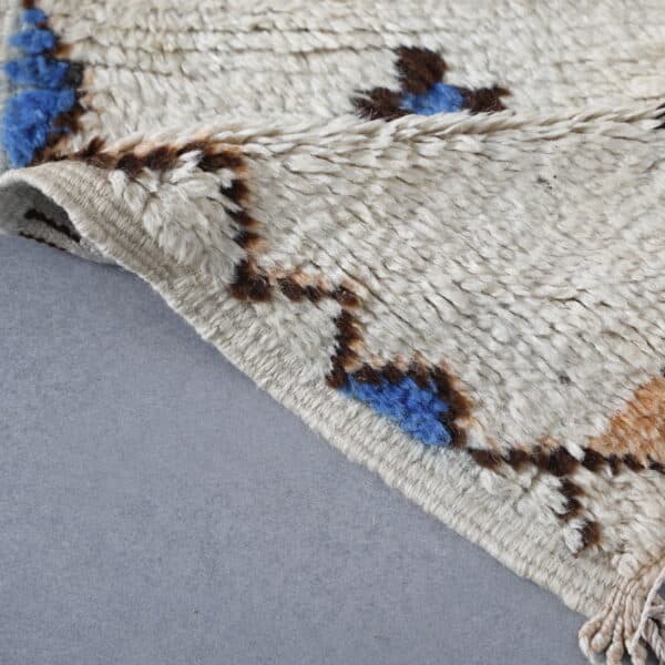 Vintage Azilal Rug 7.2×4.1 ft – Moroccan Berber Wool with Blue Geometric Motifs
