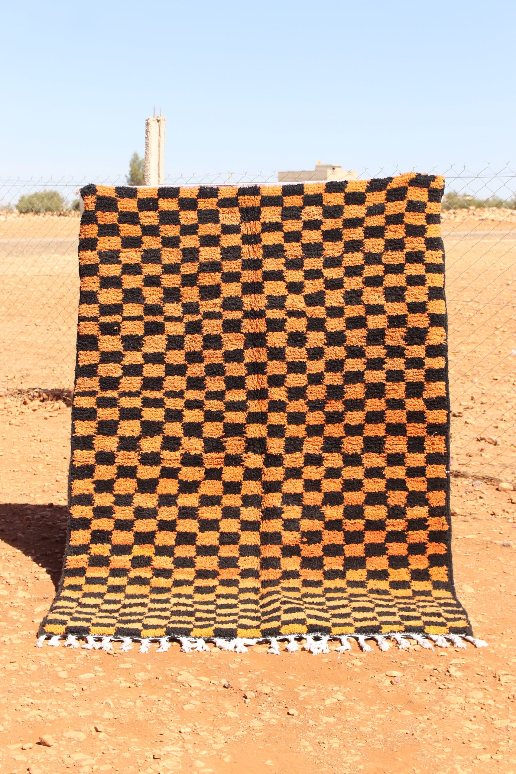Colorful Rug in black and orange