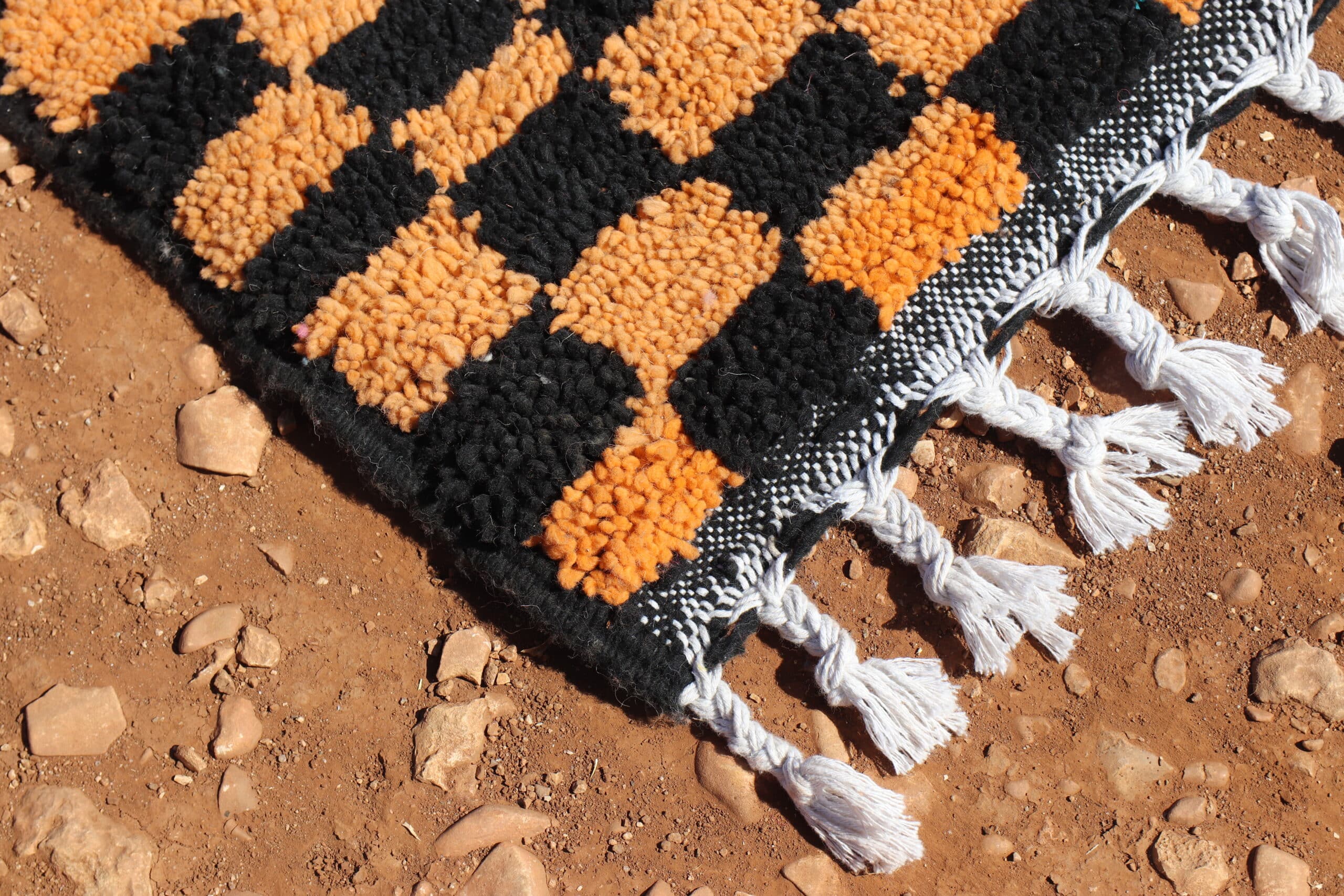 Colorful Rug in black and orange - image 4