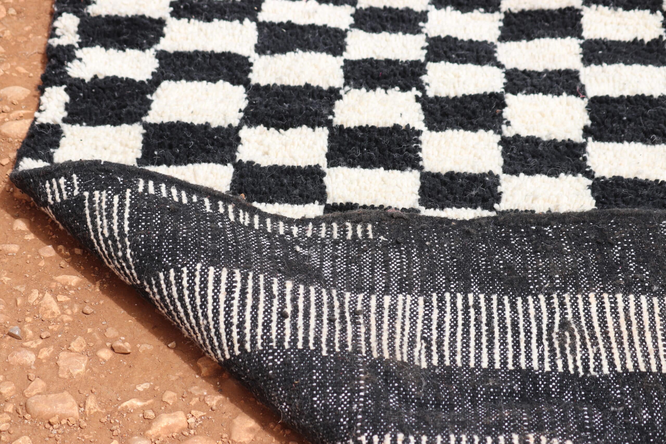 Black and white checkered rug - image 5