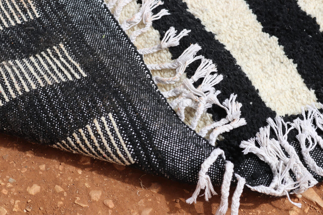 Black and white checkered rug - image 6