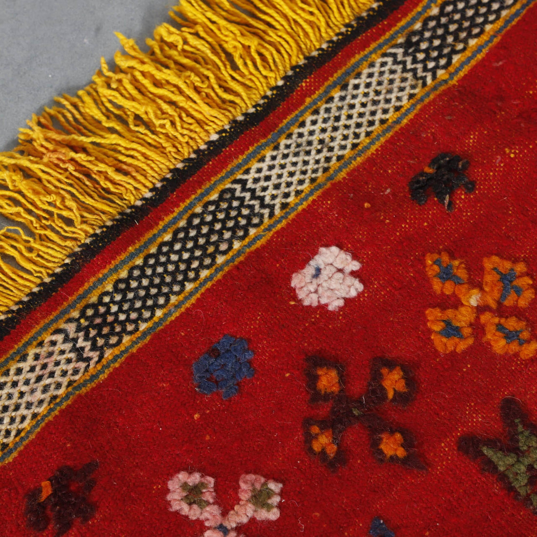 Red Moroccan Kilim rug with Dense Geometric Motifs