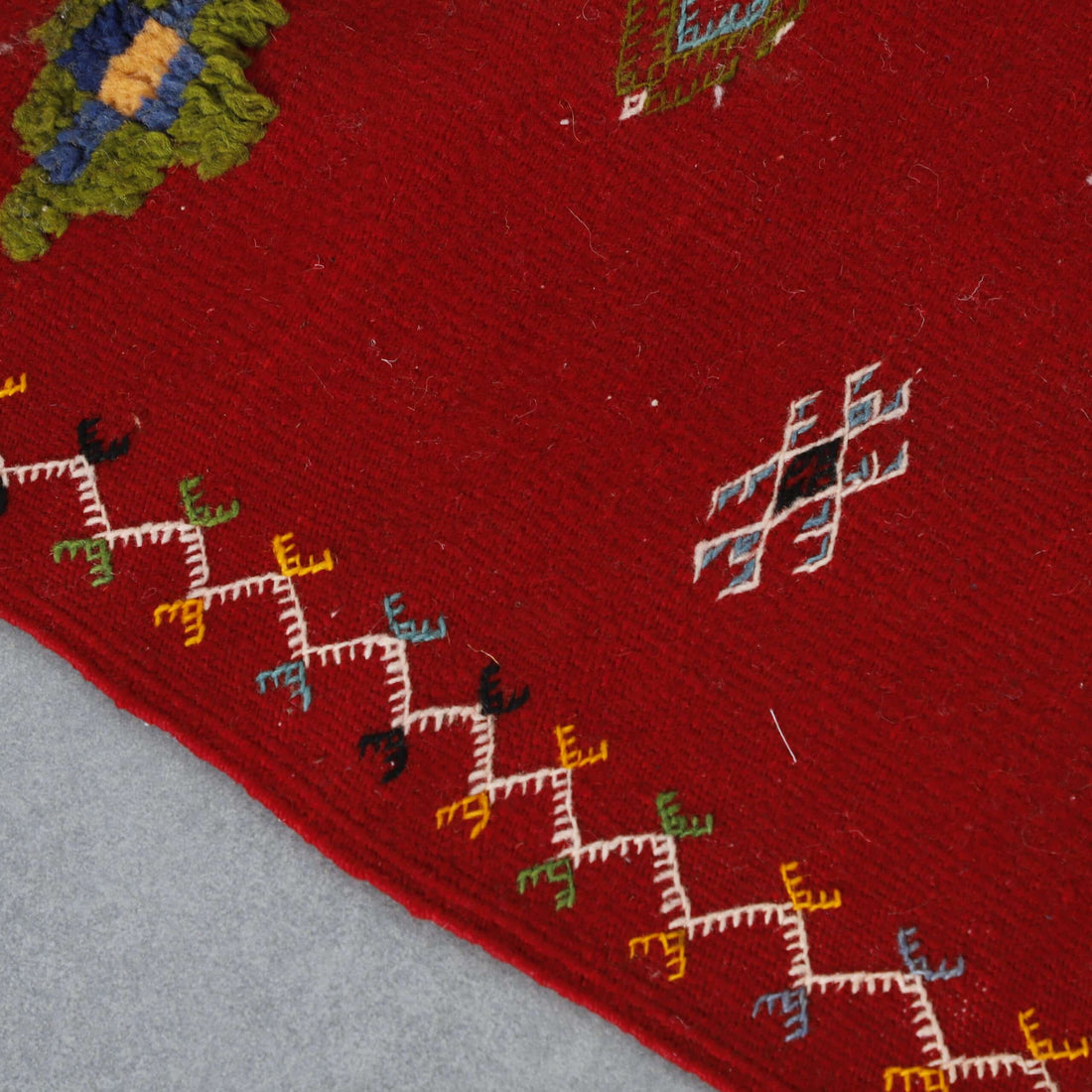 Handmade Red Berber Rug with Colorful Motifs
