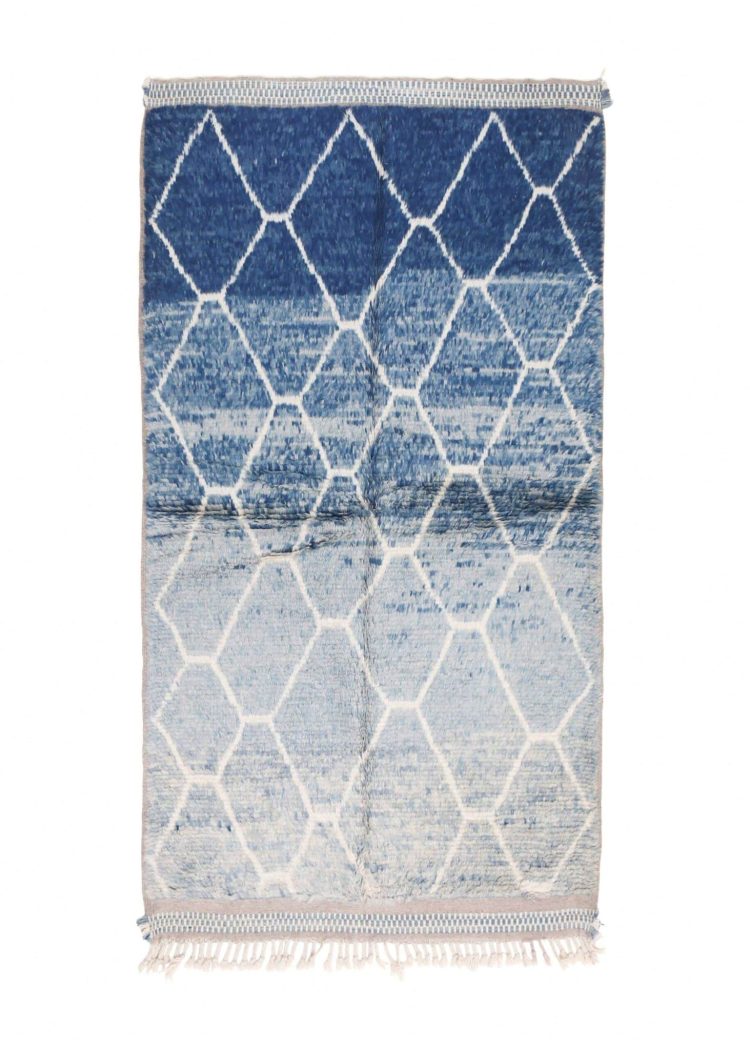 Taznakhet-blue abstract rug with handcrafted Moroccan patterns.