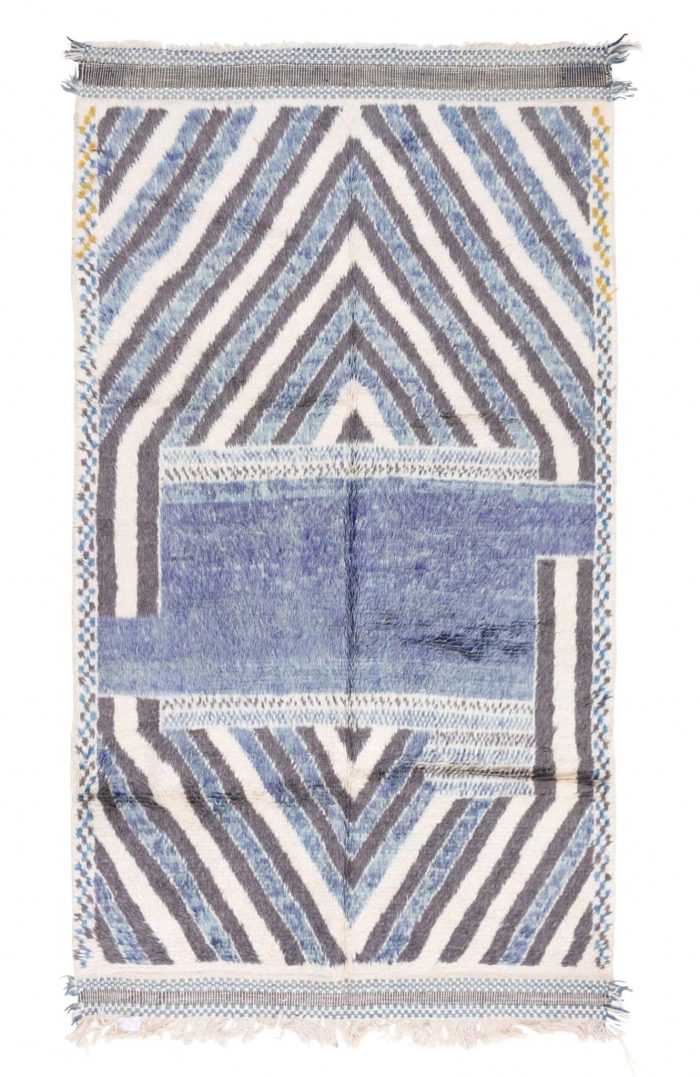 "Moroccan rug: Vibrant, intricately patterned textiles crafted with traditional techniques, adding cultural richness and visual appeal to any space."