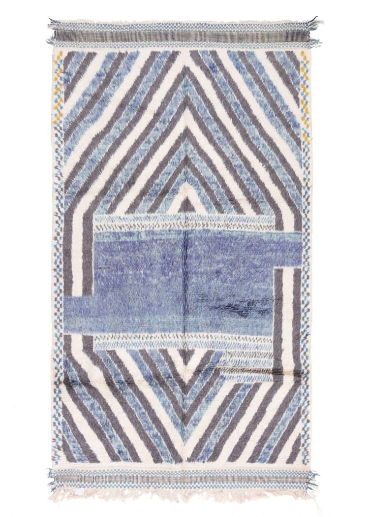 "Moroccan rug: Vibrant, intricately patterned textiles crafted with traditional techniques, adding cultural richness and visual appeal to any space."