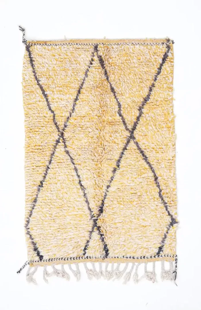 Hand-knotted Moroccan rug with intricate design and vibrant colors.