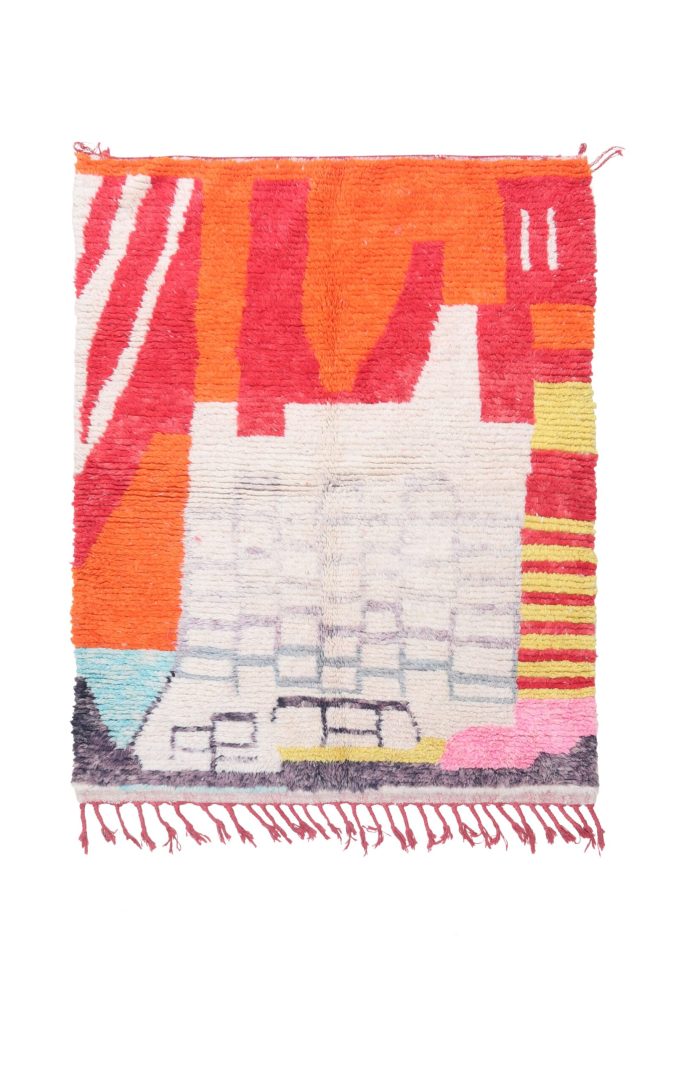 abstract art area rug with bold patterns and vibrant colors.