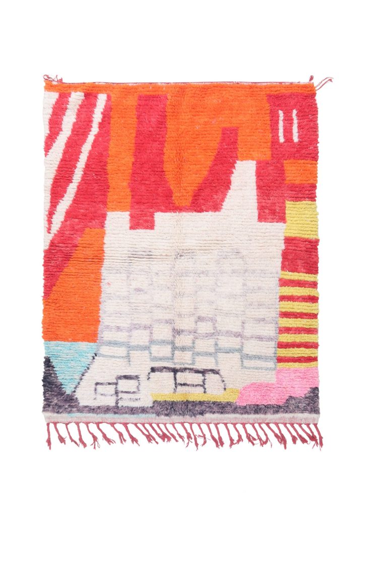 abstract art area rug with bold patterns and vibrant colors.