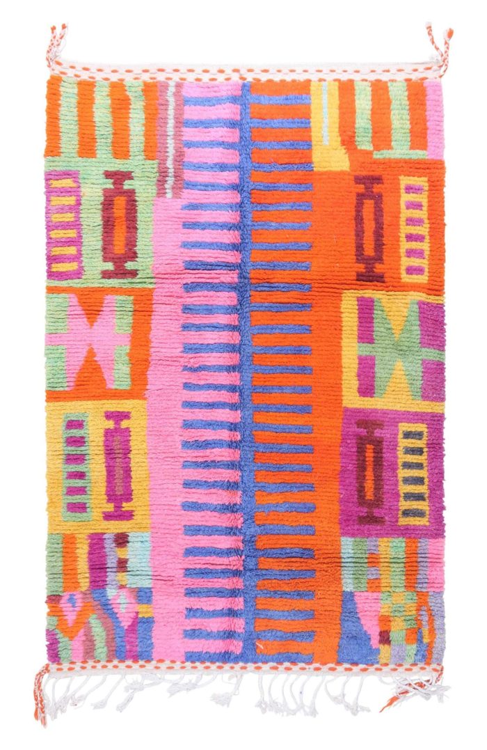 Vibrant handwoven colorful moroccan rug geometric patterns on beige background