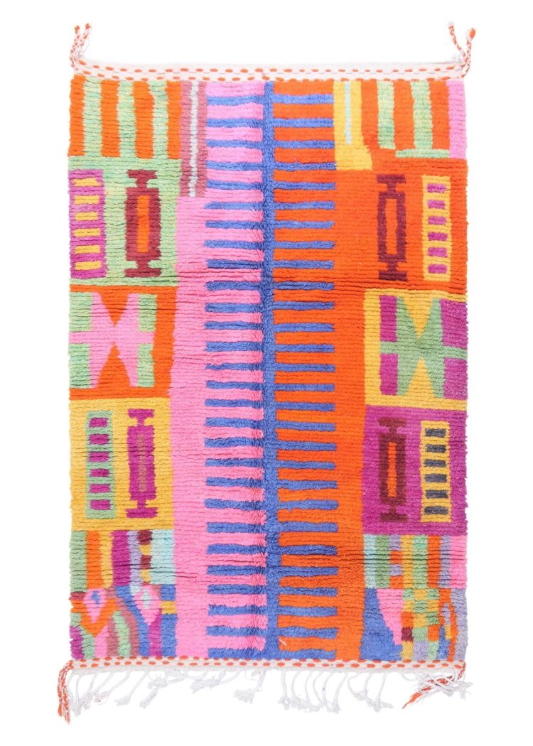 Handwoven Moroccan colorful rug with vibrant hues and intricate patterns, crafted from high-quality natural fibers for home decor.