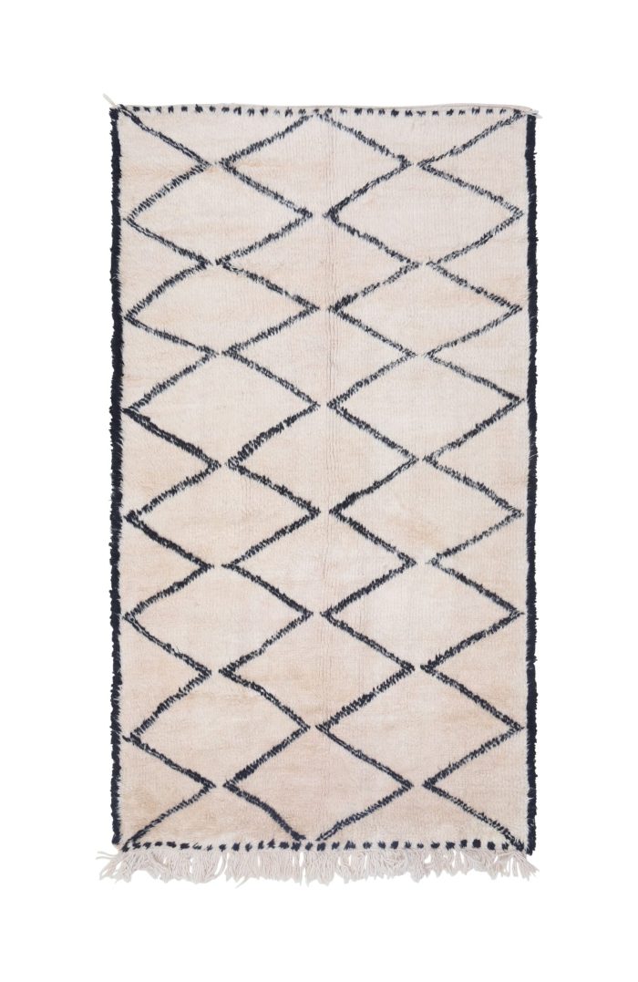 Luxurious handwoven Moroccan Beni Ourain Rug with black-and-white geometric patterns