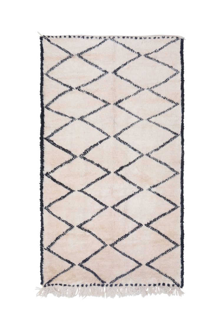 Luxurious handwoven Moroccan Beni Ourain Rug with black-and-white geometric patterns