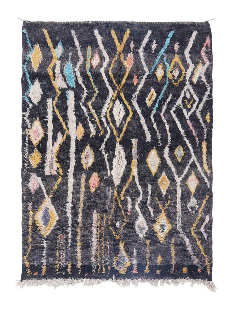 Handwoven Moroccan Bohemian Rug with vibrant colors and intricate patterns.