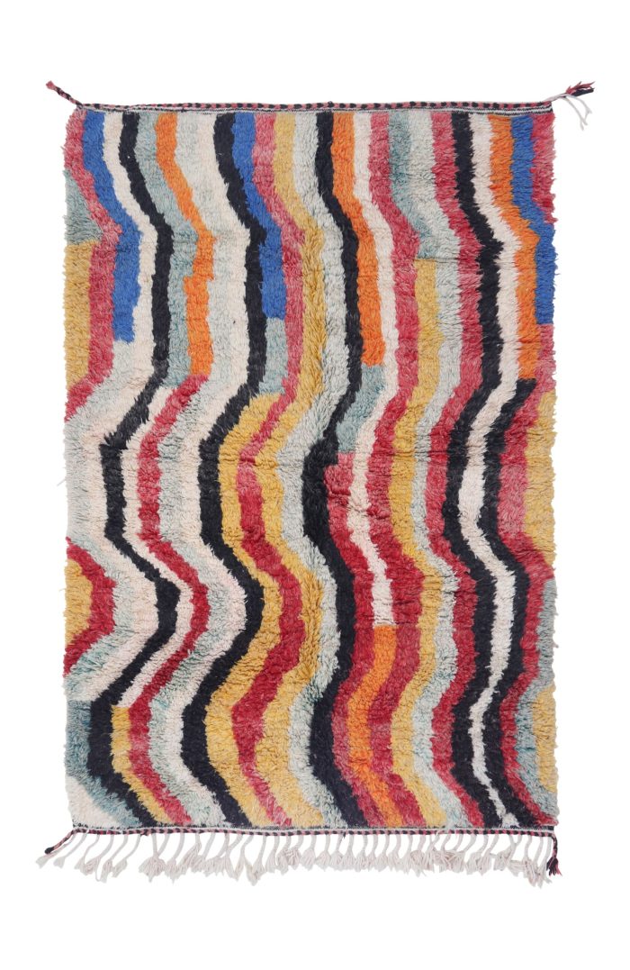 Handwoven Abstract Moroccan Rug with vibrant colors and intricate patterns.