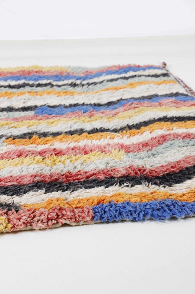 Handwoven Abstract Moroccan Rug with vibrant colors and intricate patterns. Handwoven Abstract Moroccan Rug with vibrant colors and intricate patterns.