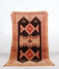 Brown Vintage Area Rug - Handwoven with intricate patterns and warm brown tones