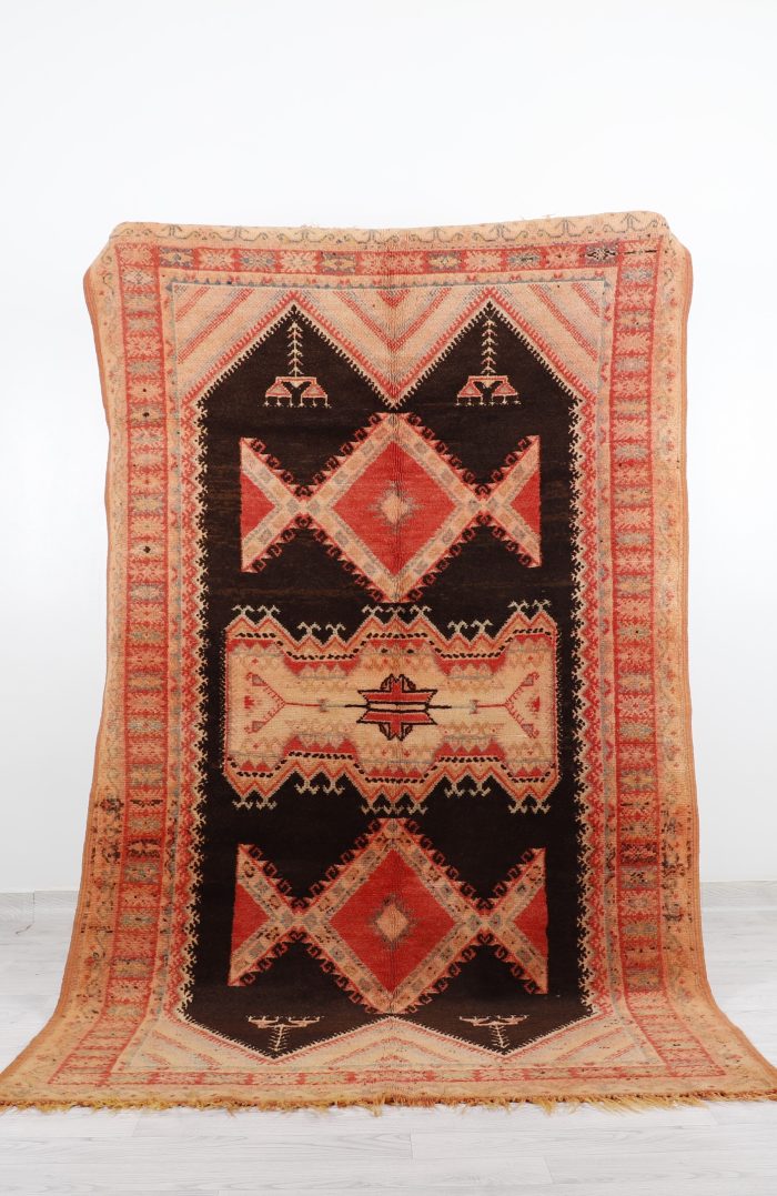 Brown Vintage Area Rug - Handwoven with intricate patterns and warm brown tones