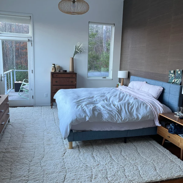 Professional installation of Berber carpet in a modern bedroom setting