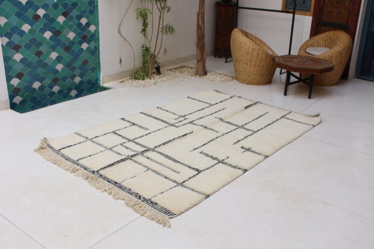 Exclusive Beni Moroccan Rug handwoven from premium natural wool, featuring unique geometric patterns.