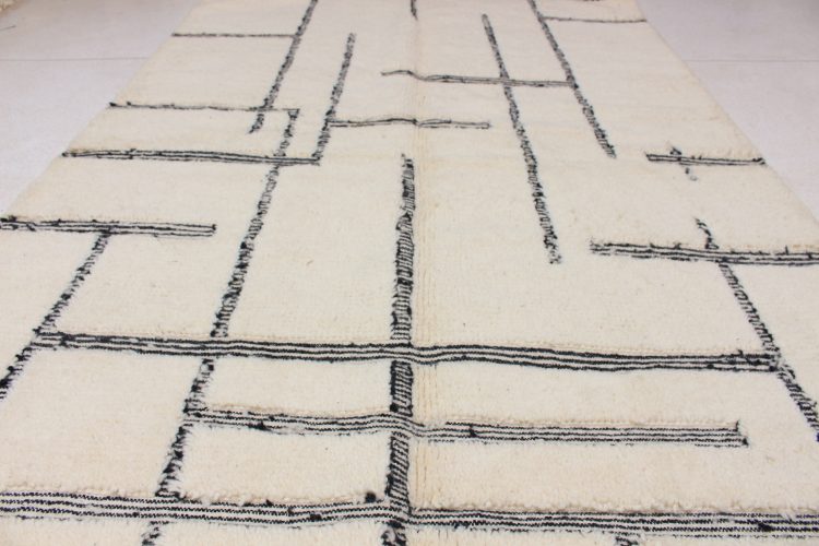 Exclusive Beni Moroccan Rug handwoven from premium natural wool, featuring unique geometric patterns.