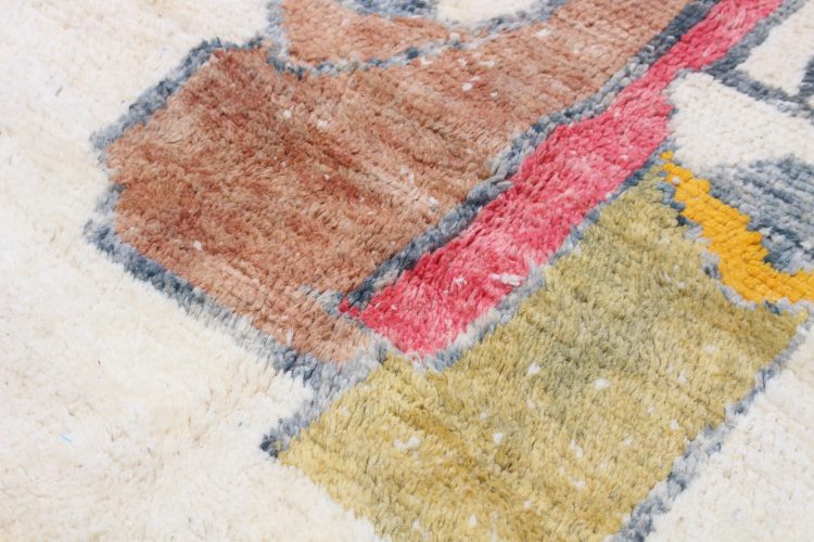 Colorful Berber Beni Ourain Rug, handwoven Moroccan wool carpet with traditional patterns and vibrant colors.