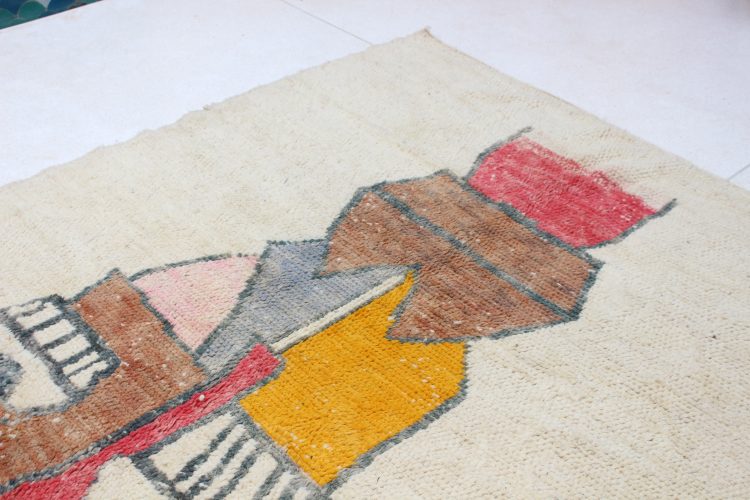 Colorful Berber Beni Ourain Rug, handwoven Moroccan wool carpet with traditional patterns and vibrant colors.