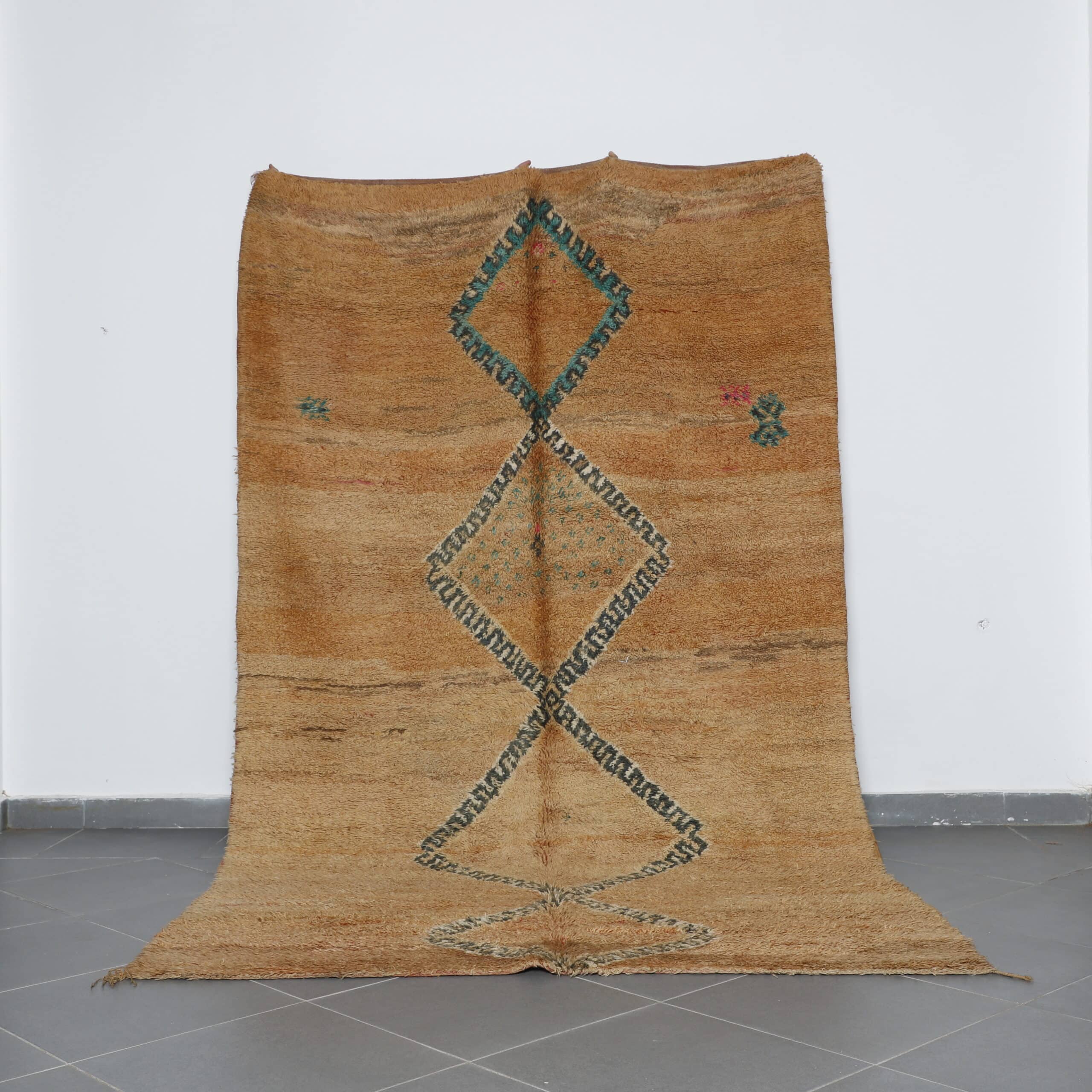 Vintage Oulmes Rug 10.5×6.0 Ft with geometric diamond pattern in earthy brown tones, handcrafted in Morocco.