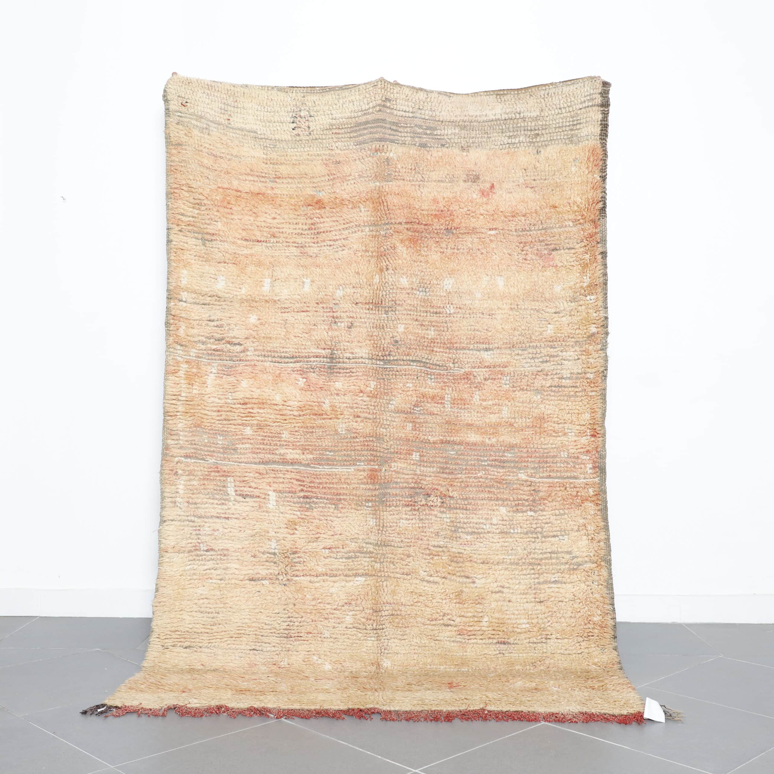 Vintage Beni Mguild handmade Moroccan wool rug with beige and orange earthy tones