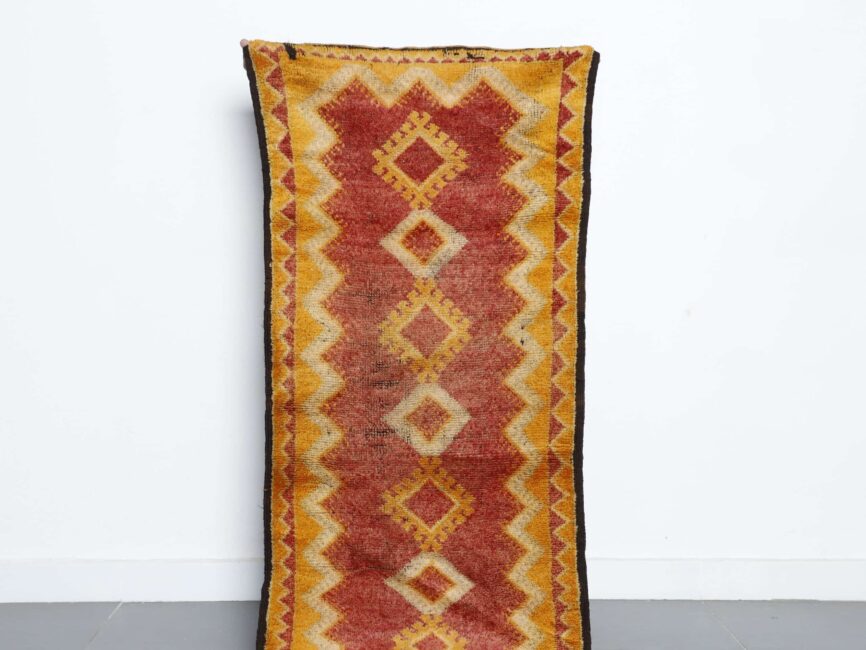 Vintage Taznakht rug 4.9×2.3 ft handmade Moroccan wool rug in warm red and golden tones