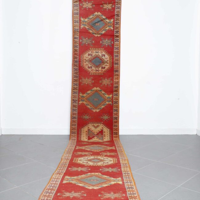 Taznakht Runner 14.9×2.9 ft handmade Moroccan wool rug in red with tribal geometric motifs