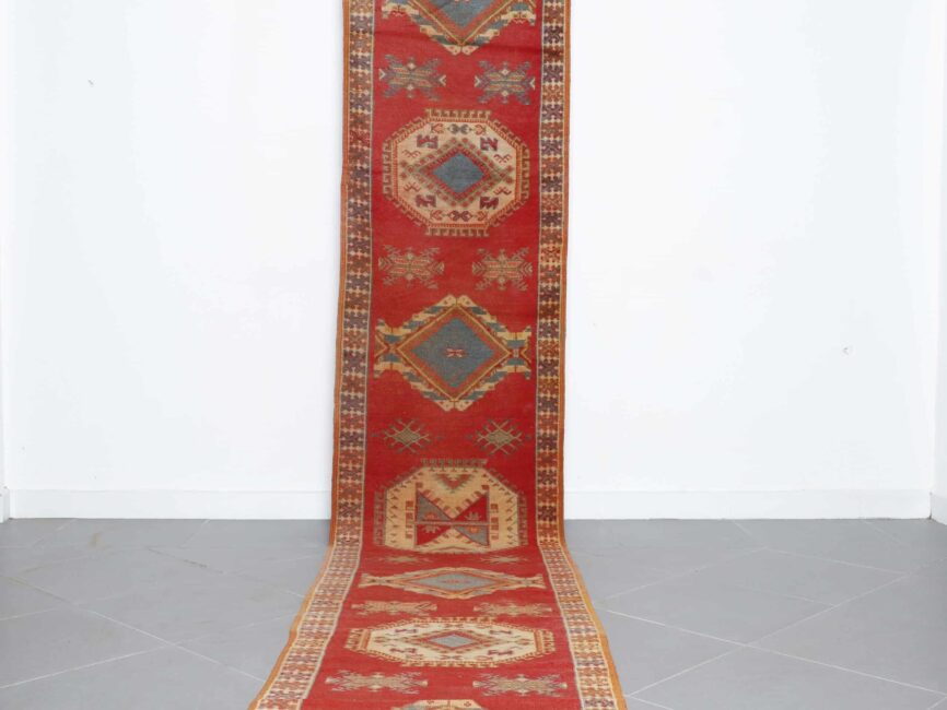 Taznakht Runner 14.9×2.9 ft handmade Moroccan wool rug in red with tribal geometric motifs