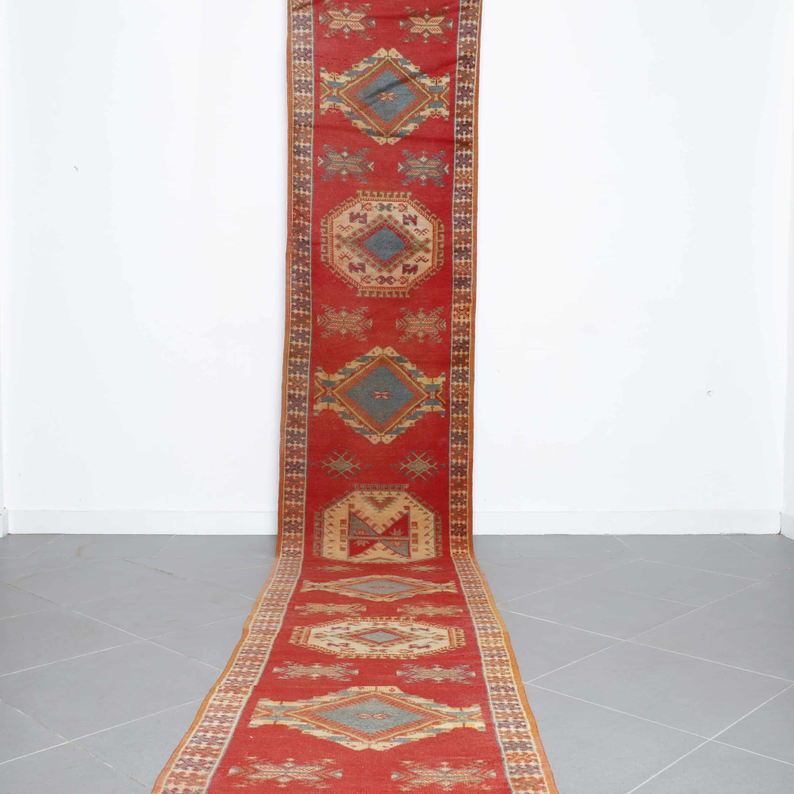 Taznakht Runner 14.9×2.9 ft handmade Moroccan wool rug in red with tribal geometric motifs