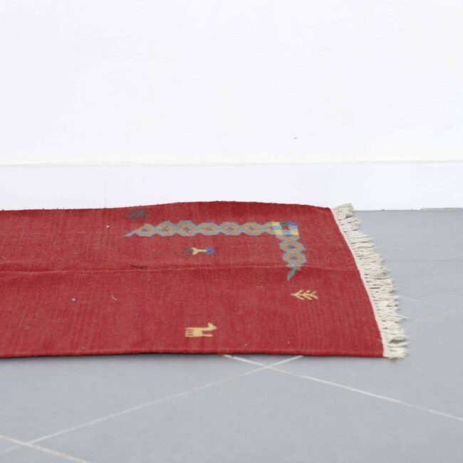 Handmade Red Moroccan Kilim rug with Symbolic Motifs - Image 2